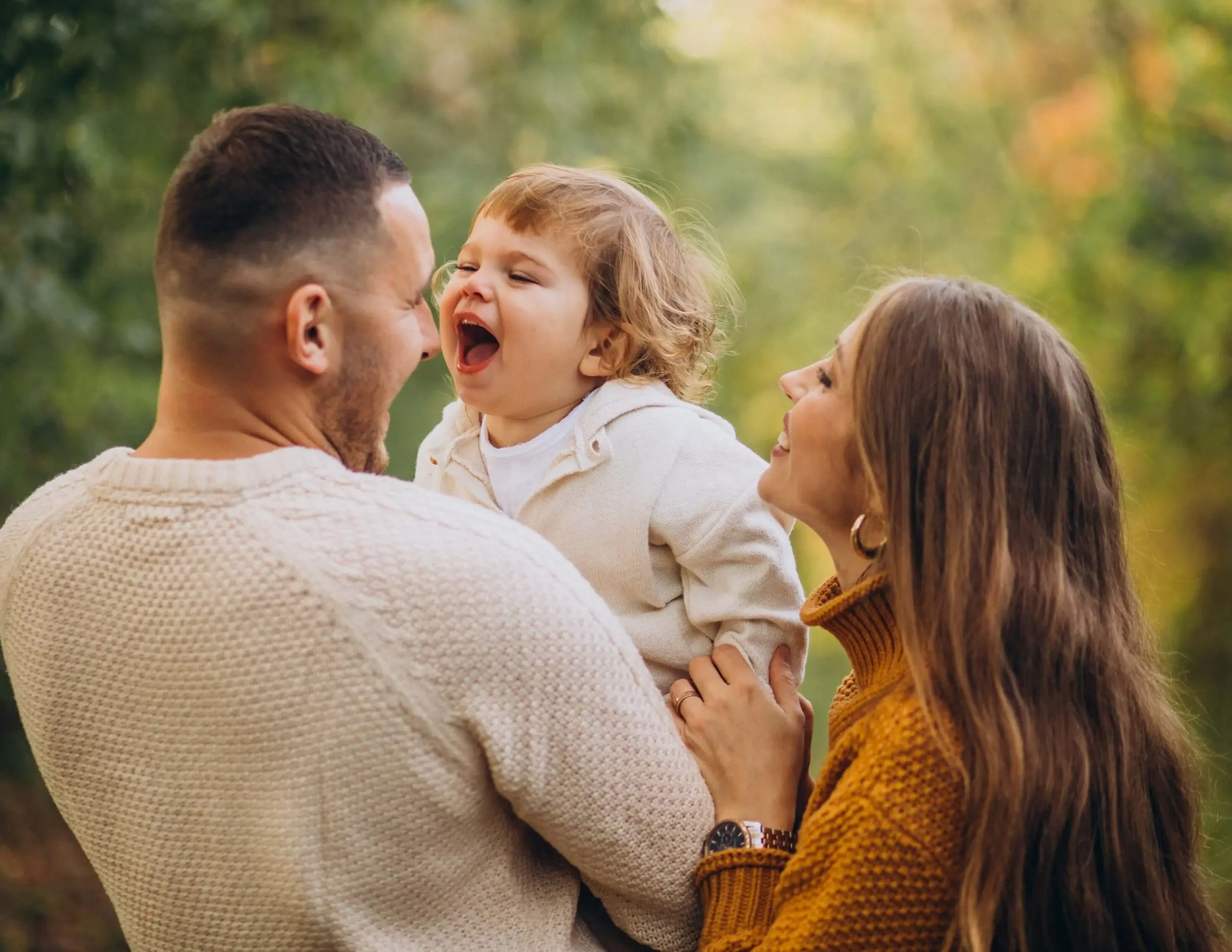 young-family-with-children-autumn-park-scaled