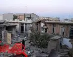 اقدام این کودک کرمانشاهی روی خرابه های زلزله اشک همه را در آورد+عکس