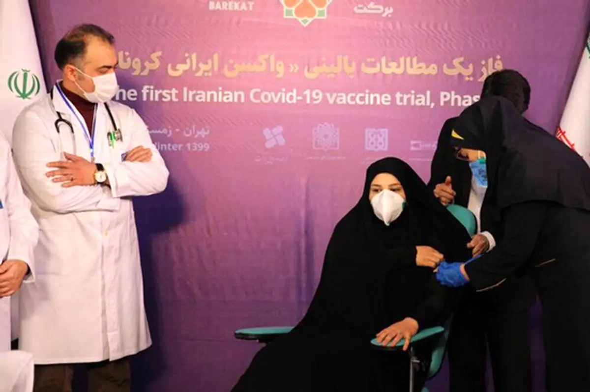 اولین واکسن کرونا روی یک بانو تزریق شد + عکس